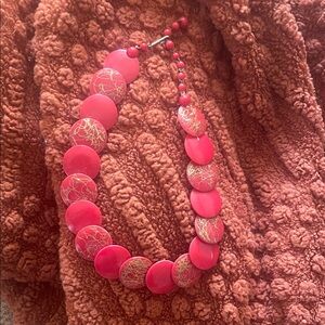 Vintage red medallion statement necklace with gold speckle detail